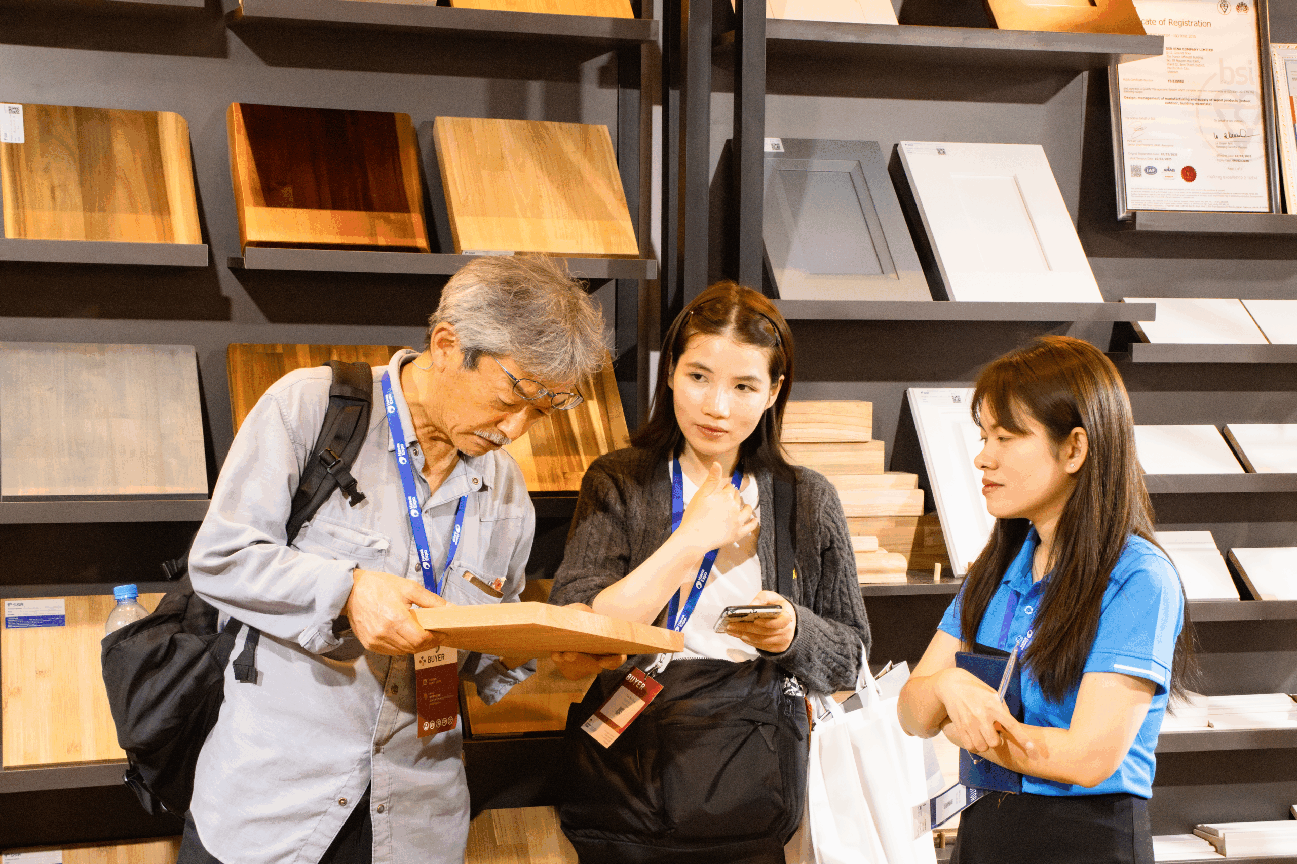 Buyer group reviewing deck tiles options and certifications